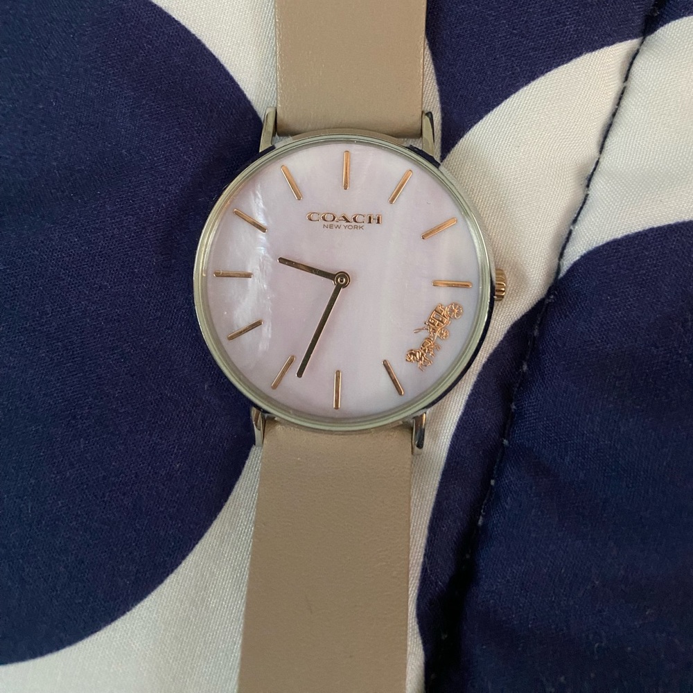 Coach watch purple shell face with rosegold detail, silver body